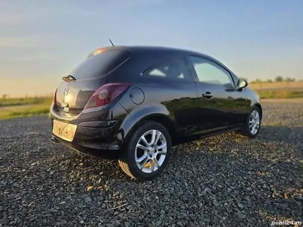 Second-hand Opel Corsa 101 CP (74 kW) 2010 Negru Hatchback