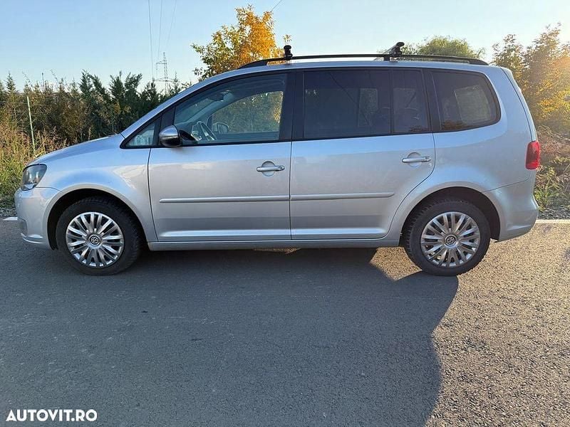 Second-hand VW Touran 140 CP (102 kW) 2011 Culoareargint Monovolum