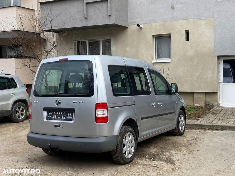 Second-hand VW Caddy Maxi 105 CP (77 kW) 2009 Culoareargint Monovolum