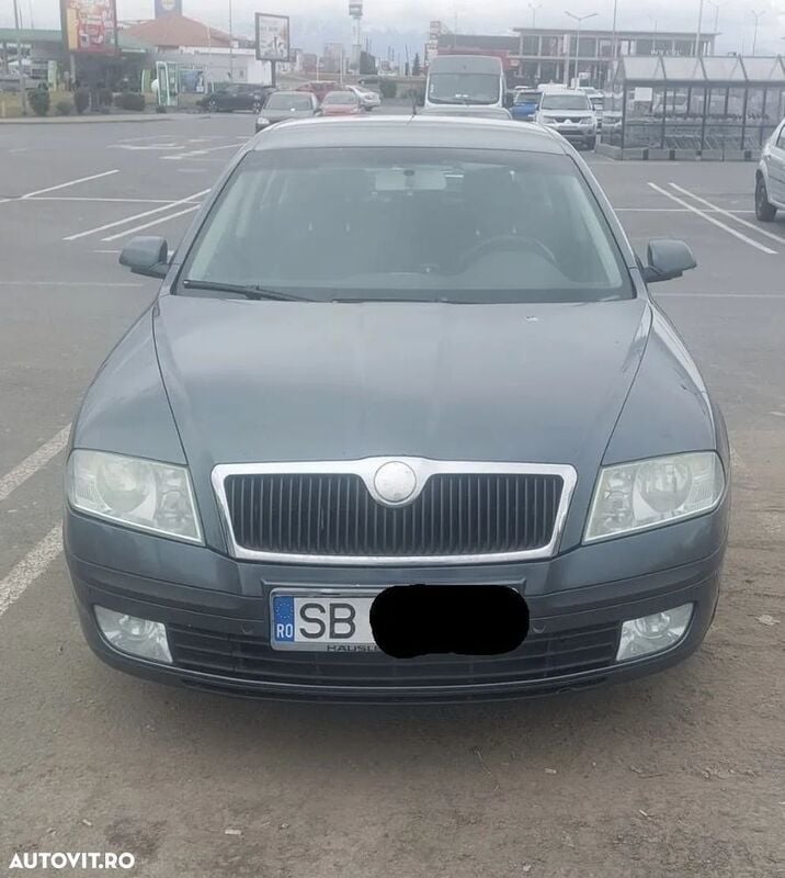 Gri Utilizat 2006 Skoda Octavia Business Line Berlinǎ | 2.950 EUR (Preț OK) - Imagine 1/4