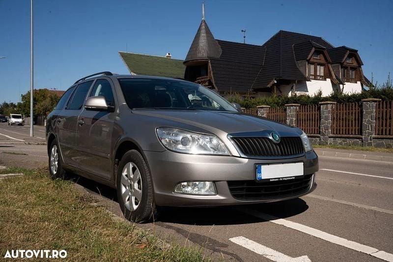 Argint Utilizat 2011 Skoda Octavia Ambiente Break | 4.200 EUR (Preț bun) - Imagine 1/4