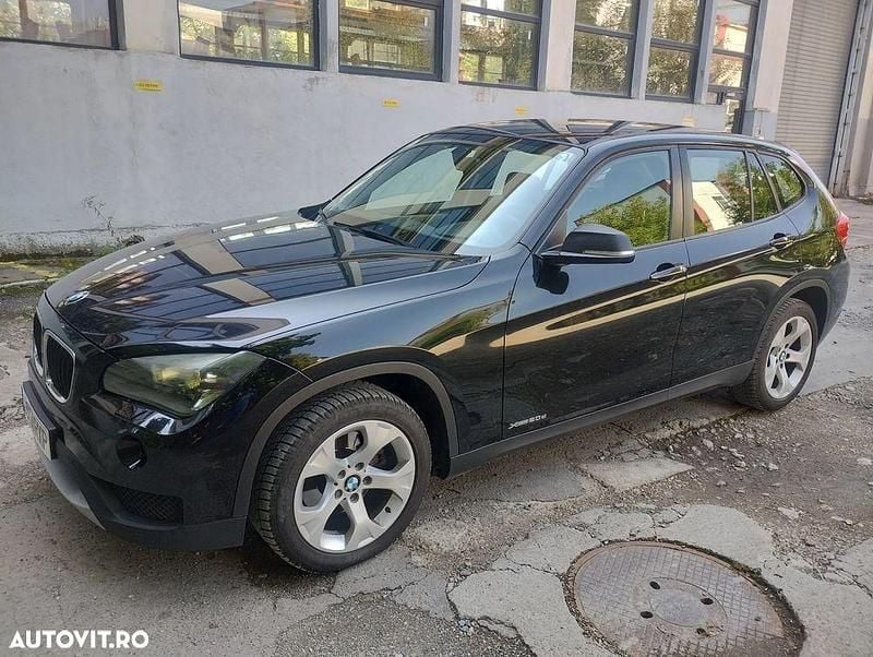 Culoarenegru Utilizat 2013 BMW X1 SUV | 9.300 EUR (Super Preț) - Imagine 1/4