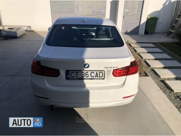 Second-hand BMW 320 184 CP (135 kW) 2013 Alb Berlinǎ