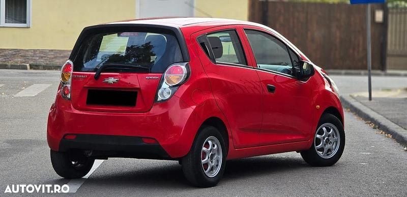 Second-hand Chevrolet Spark 65 CP (47 kW) 2011 Culoarerosu Hatchback