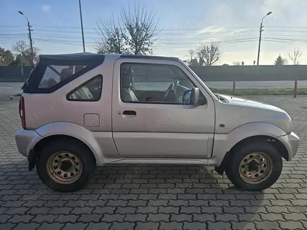 Second-hand Suzuki Jimny 80 CP (58 kW) 2003 Auriu SUV