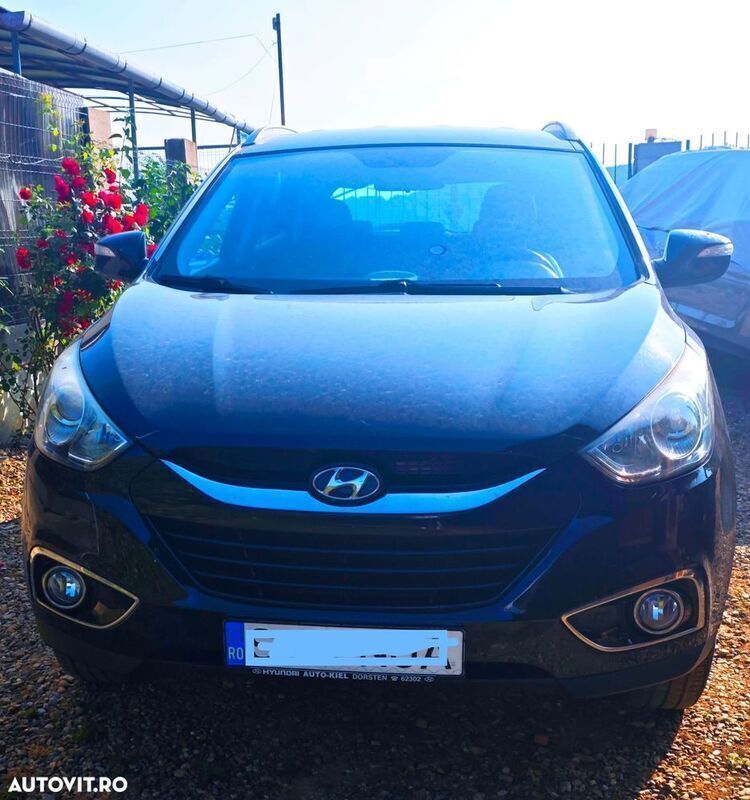 Negru Utilizat 2011 Hyundai ix35 Style SUV | 9.100 EUR - Imagine 1/4
