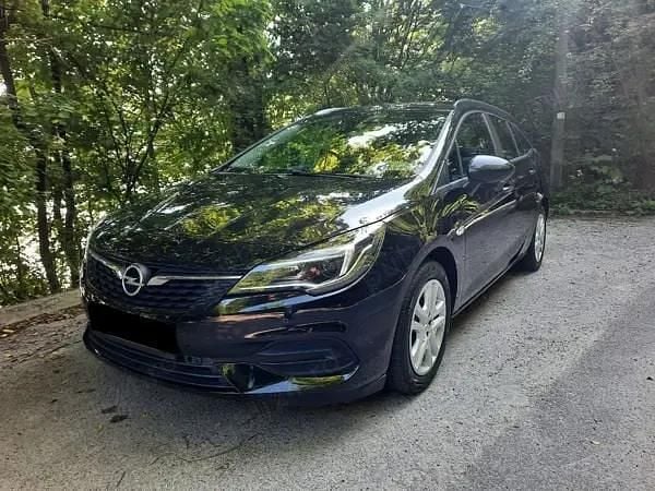 Culoarenegru Utilizat 2020 Opel Astra Business Edition Break | 8.600 EUR (Preț bun) - Imagine 1/4