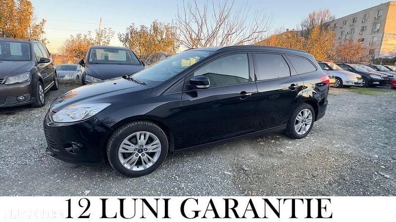Culoarenegru Utilizat 2014 Ford Focus Break | 4.650 EUR (Preț OK) - Imagine 1/4