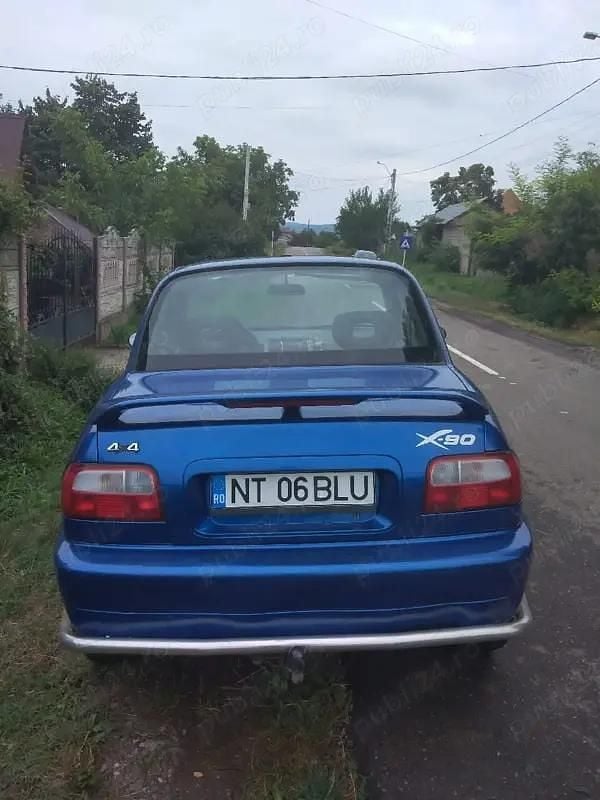 Second-hand Suzuki X-90 100 CP (73 kW) 1996 Albastru Coupe
