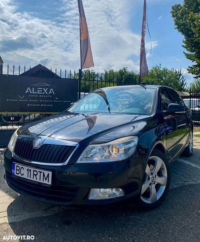 Culoarenegru Utilizat 2009 Skoda Octavia Business Line Berlinǎ | 4.299 EUR (Preț OK) - Imagine 1/4