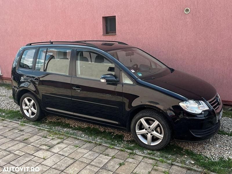 Culoarenegru Utilizat 2008 VW Touran Monovolum | 2.300 EUR - Imagine 1/4