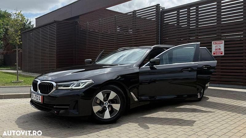 Second-hand BMW 520 Sport Line 190 CP (139 kW) 2022 Negru Break