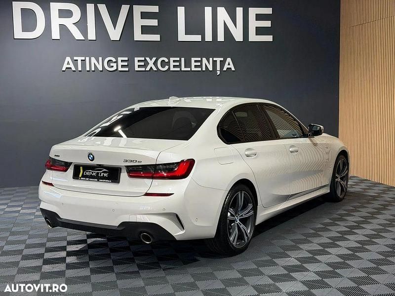 Second-hand BMW 330e Exclusive 292 CP (214 kW) 2021 Culoarealb Berlinǎ