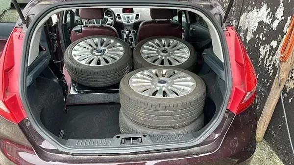 Second-hand Ford Fiesta Titanium 90 CP (66 kW) 2009 Violet Hatchback