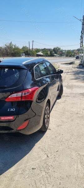 Negru Utilizat 2016 Hyundai i30 Berlinǎ | 6.499 EUR (Super Preț) - Imagine 1/4