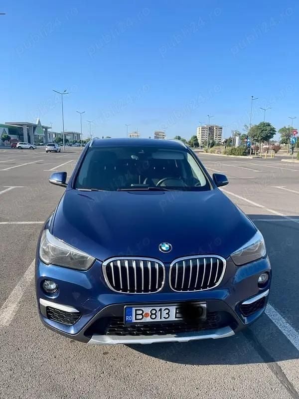 Albastru Second-hand 2017 BMW X1 SUV | 12.900 EUR (Preț bun) - Imagine 1/4