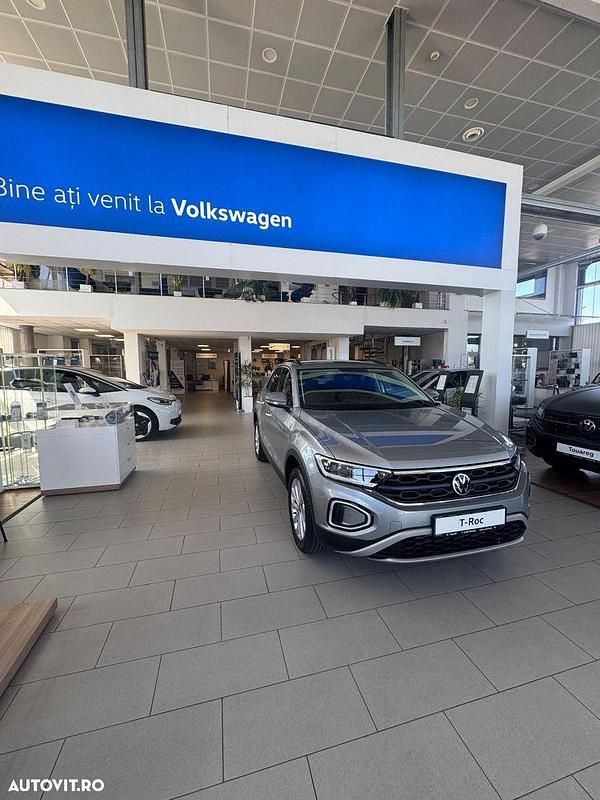 Culoareargint Nouă 2025 VW T-Roc Advance SUV | 29.117 EUR (Preț OK) - Imagine 1/4