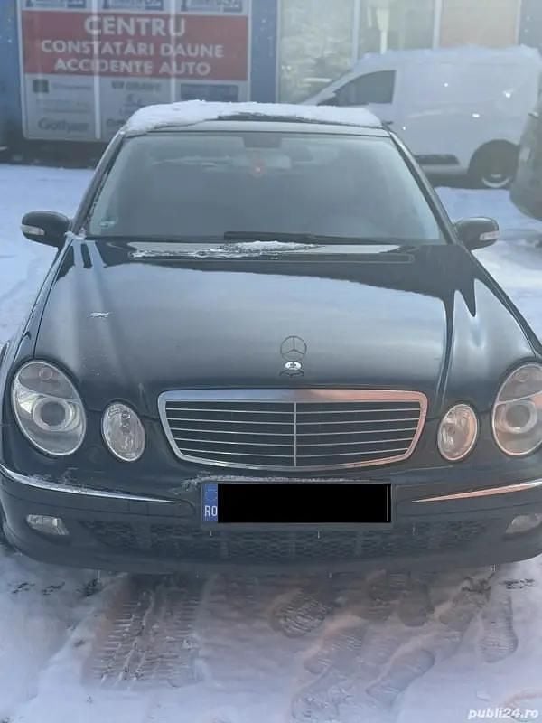 Second-hand Mercedes E320 224 CP (164 kW) 2006 Negru Berlinǎ