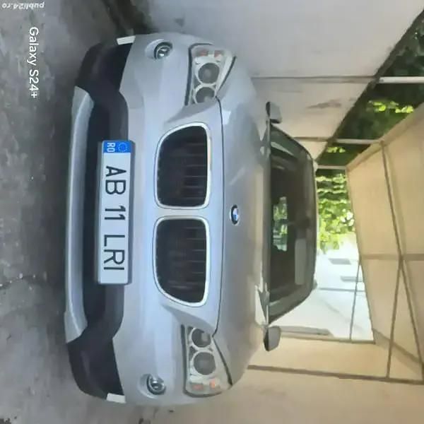Gri Utilizat 2012 BMW X1 SUV | 9.300 EUR (Preț bun) - Imagine 1/4