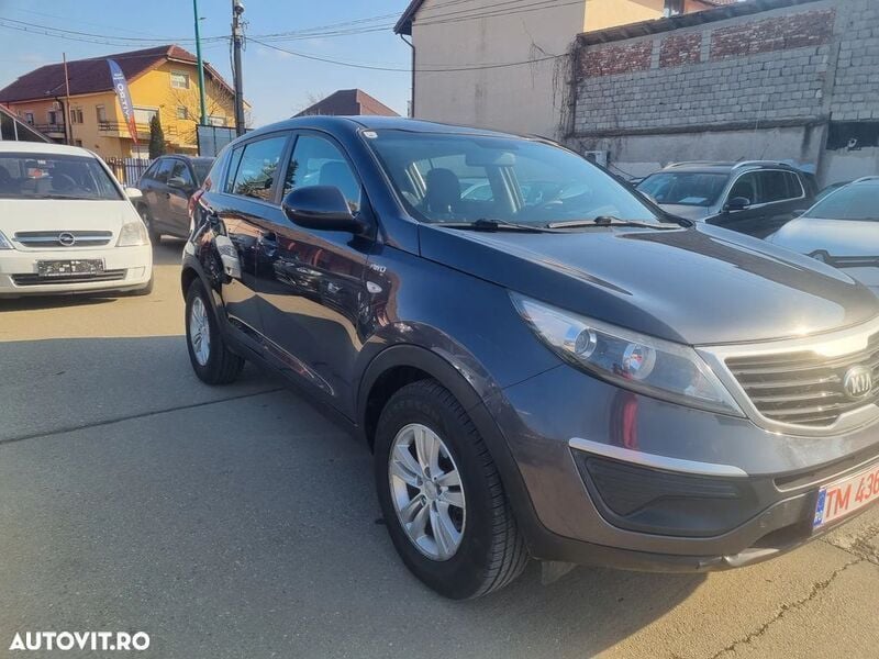 Gri Utilizat 2013 Kia Sportage DREAM-TEAM Edition SUV | 8.450 EUR (Preț bun) - Imagine 1/4
