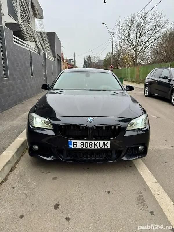 Negru Second-hand 2011 BMW 520 Berlinǎ | 8.600 EUR (Preț bun) - Imagine 1/4