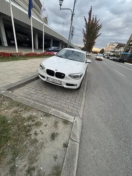 Alb Utilizat 2012 BMW 118 Hatchback | 9.500 EUR - Imagine 1/4