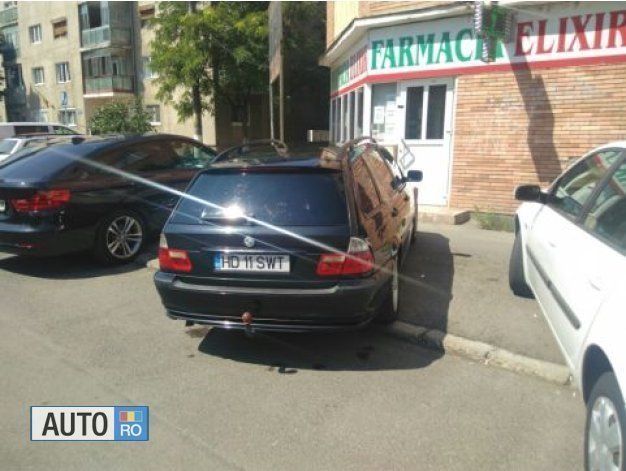 Second-hand BMW 320 136 CP (100 kW) 2001 Negru Break