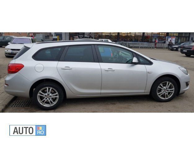 Argintiu Utilizat 2014 Opel Astra Break | 7.790 EUR (Scump) - Imagine 1/4