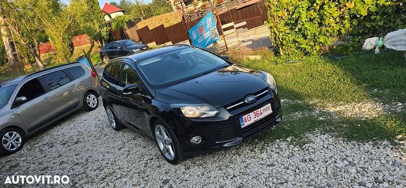 Culoarenegru Utilizat 2014 Ford Focus Titanium Break | 5.299 EUR (Preț bun) - Imagine 1/4