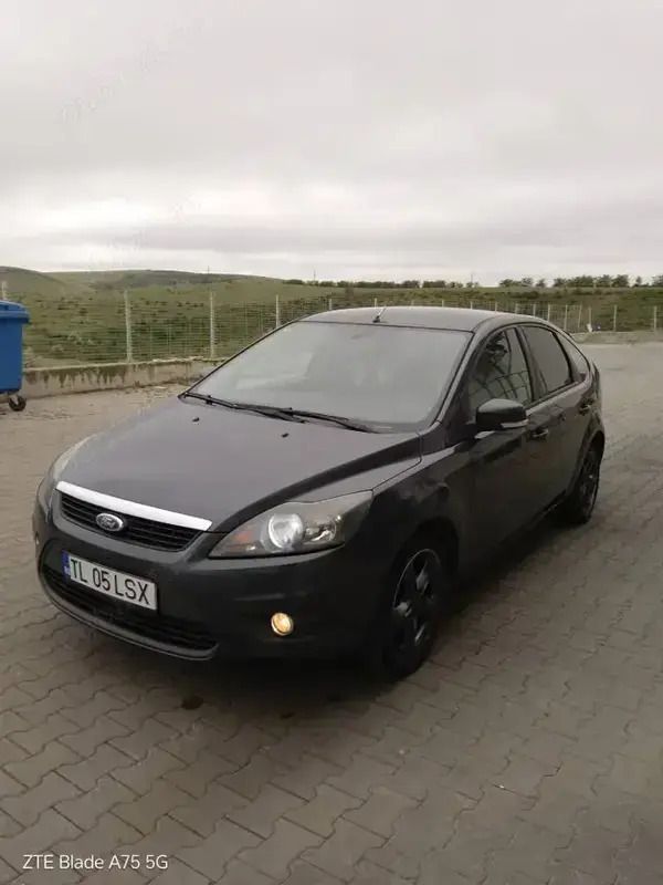 Gri Utilizat 2009 Ford Focus Ghia Hatchback | 2.500 EUR (Preț OK) - Imagine 1/4