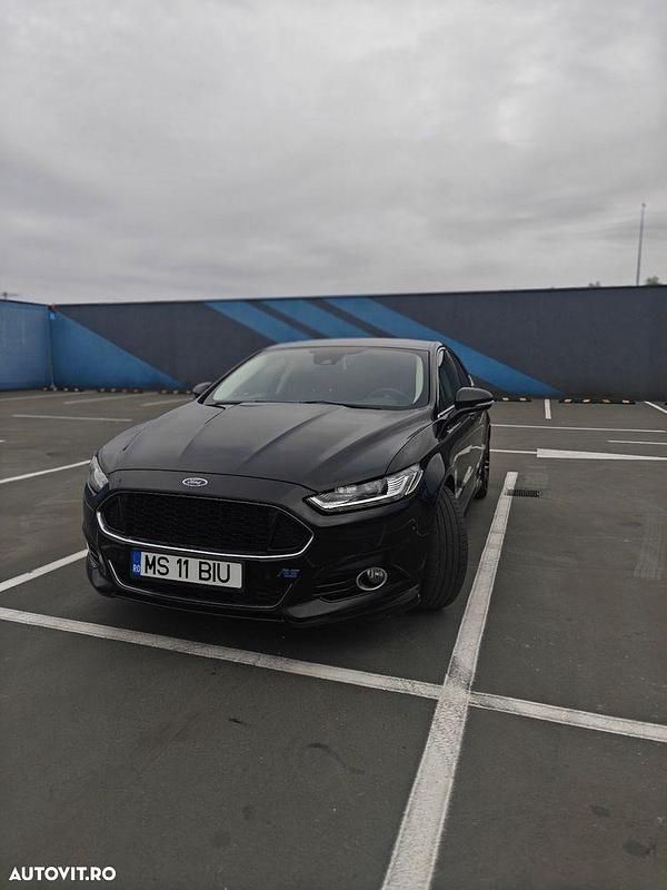 Culoarenegru Utilizat 2015 Ford Mondeo Berlinǎ | 10.500 EUR - Imagine 1/4