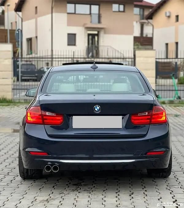 Second-hand BMW 320 184 CP (135 kW) 2012 Albastru Berlinǎ