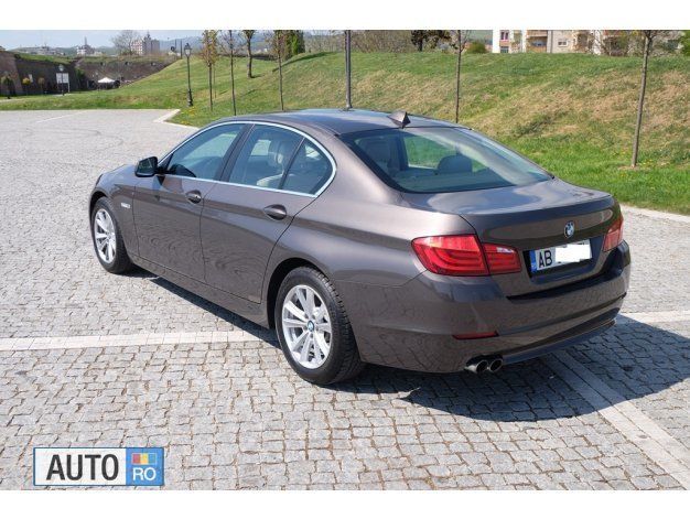 Second-hand BMW 520 Sport Line 170 CP (125 kW) 2012 Maro metalizat Berlinǎ