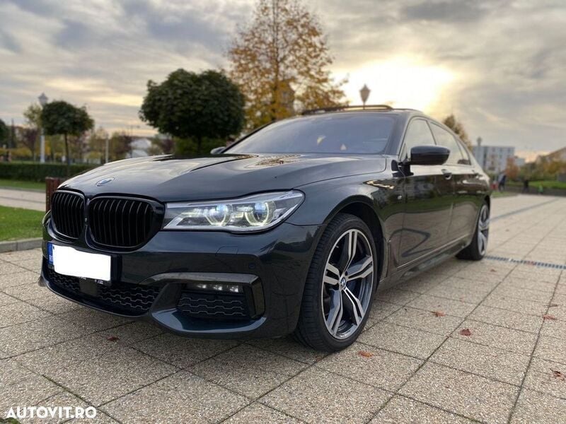 Gri Utilizat 2017 BMW 750L Berlinǎ | 37.500 EUR - Imagine 1/4
