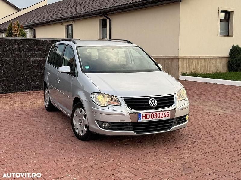 Culoareargint Utilizat 2009 VW Touran Comfortline Monovolum | 3.950 EUR (Super Preț) - Imagine 1/4