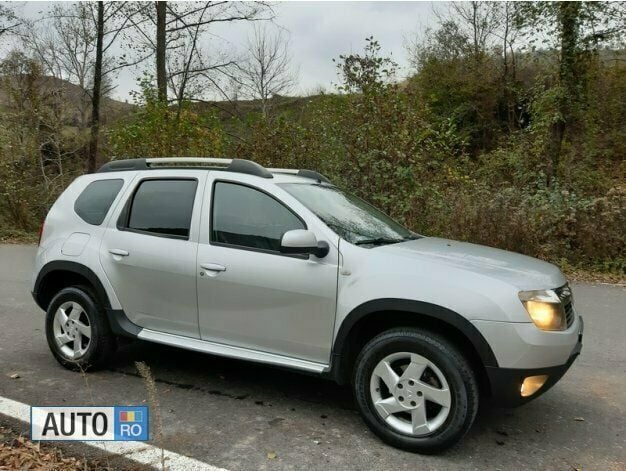 Argintiu Utilizat 2012 Dacia Duster SUV | 6.850 EUR (Preț bun) - Imagine 1/4