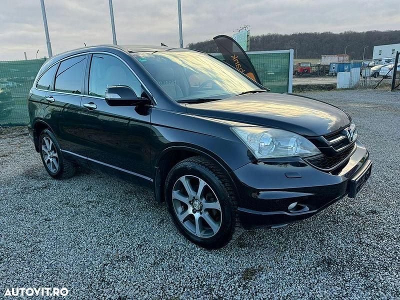 Culoarenegru Utilizat 2012 Honda CR-V Executive SUV | 9.950 EUR (Super Preț) - Imagine 1/4