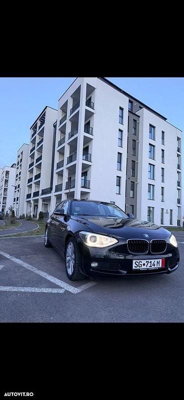 Culoarenegru Second-hand 2014 BMW 118 Sport Line Hatchback | 6.850 EUR (Preț bun) - Imagine 1/4