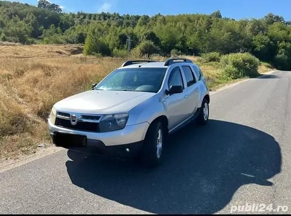Gri Utilizat 2011 Dacia Duster SUV | 5.700 EUR (Preț OK) - Imagine 1/4