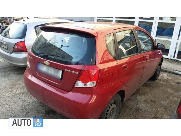 Rosu metalizat Utilizat 2007 Chevrolet Aveo Hatchback | 2.400 EUR (Preț OK) - Imagine 1/4