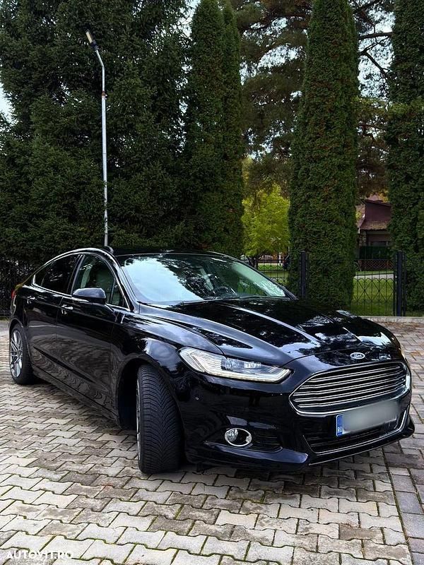 Culoarenegru Utilizat 2015 Ford Mondeo Berlinǎ | 17.900 EUR - Imagine 1/4
