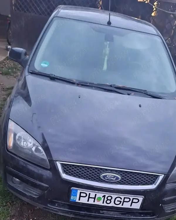 Negru Utilizat 2007 Ford Focus Titanium Coupe | 1.000 EUR (Preț bun) - Imagine 1/2