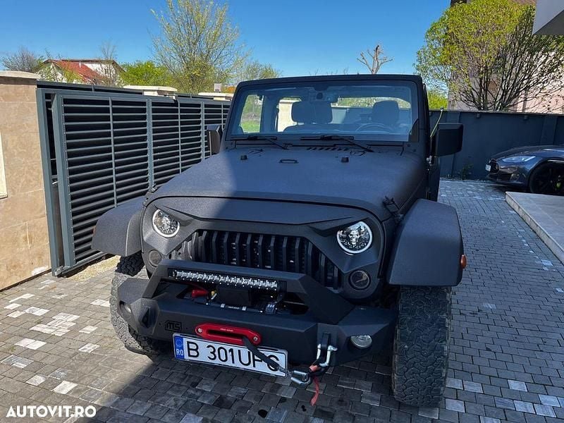 Culoarenegru Utilizat 2014 Jeep Wrangler Unlimited Rubicon SUV | 30.000 EUR (Scump) - Imagine 1/4