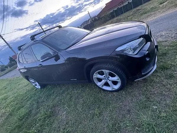 Negru Utilizat 2015 BMW X1 SUV | 13.500 EUR (Preț bun) - Imagine 1/4