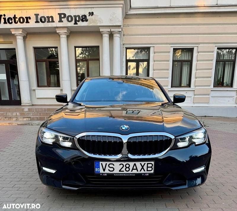 Culoarenegru Utilizat 2019 BMW 318 Berlinǎ | 19.900 EUR (Preț OK) - Imagine 1/4