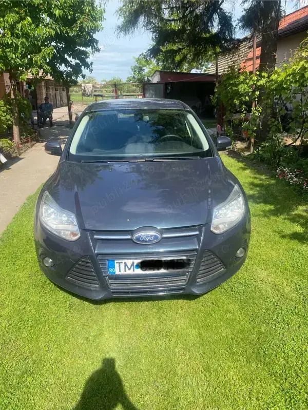 Gri Utilizat 2012 Ford Focus Berlinǎ | 3.900 EUR (Preț bun) - Imagine 1/4