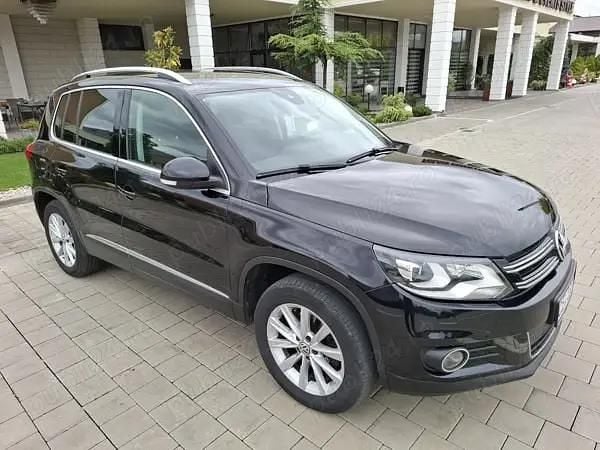 Culoarenegru Utilizat 2015 VW Tiguan Exclusive SUV | 12.999 EUR (Preț bun) - Imagine 1/4
