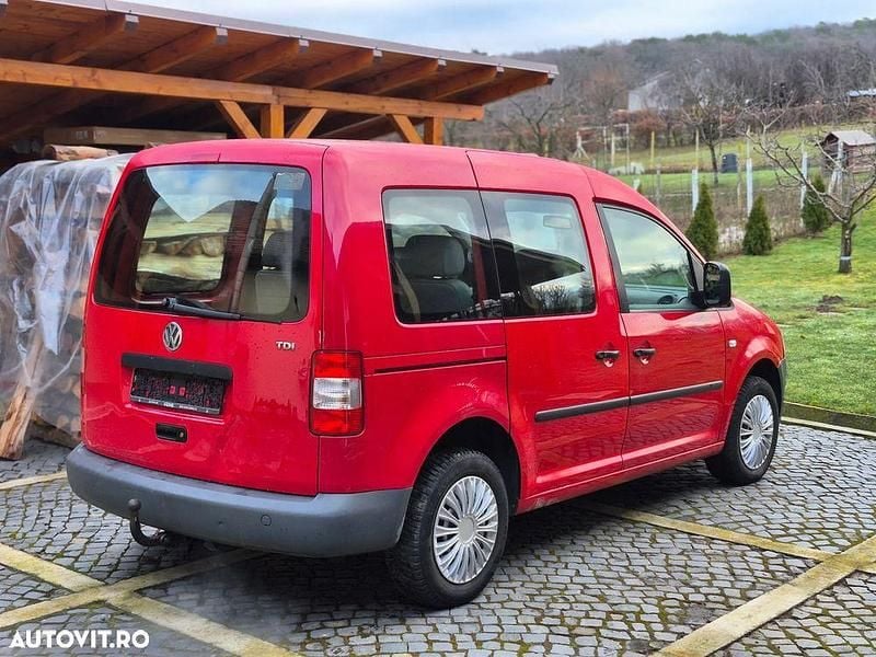 Second-hand VW Caddy Family 105 CP (77 kW) 2007 Culoarerosu Monovolum