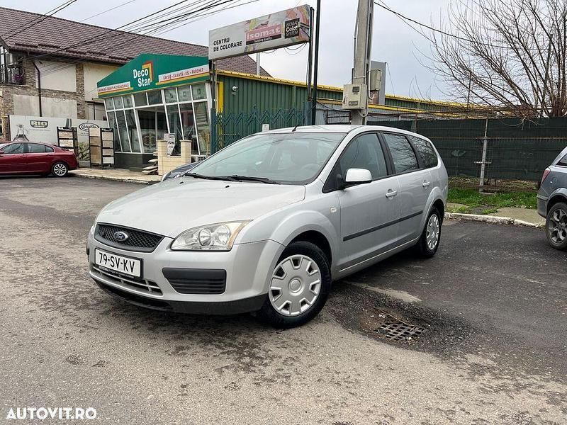 Gri Utilizat 2010 Ford Focus Titanium Break | 1.590 EUR (Super Preț) - Imagine 1/4