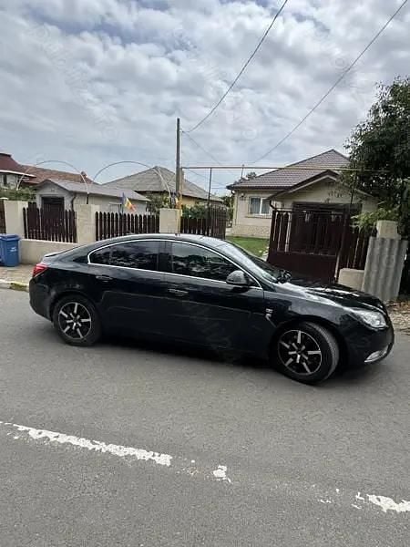 Second-hand Opel Insignia 131 CP (96 kW) 2011 Negru Berlinǎ